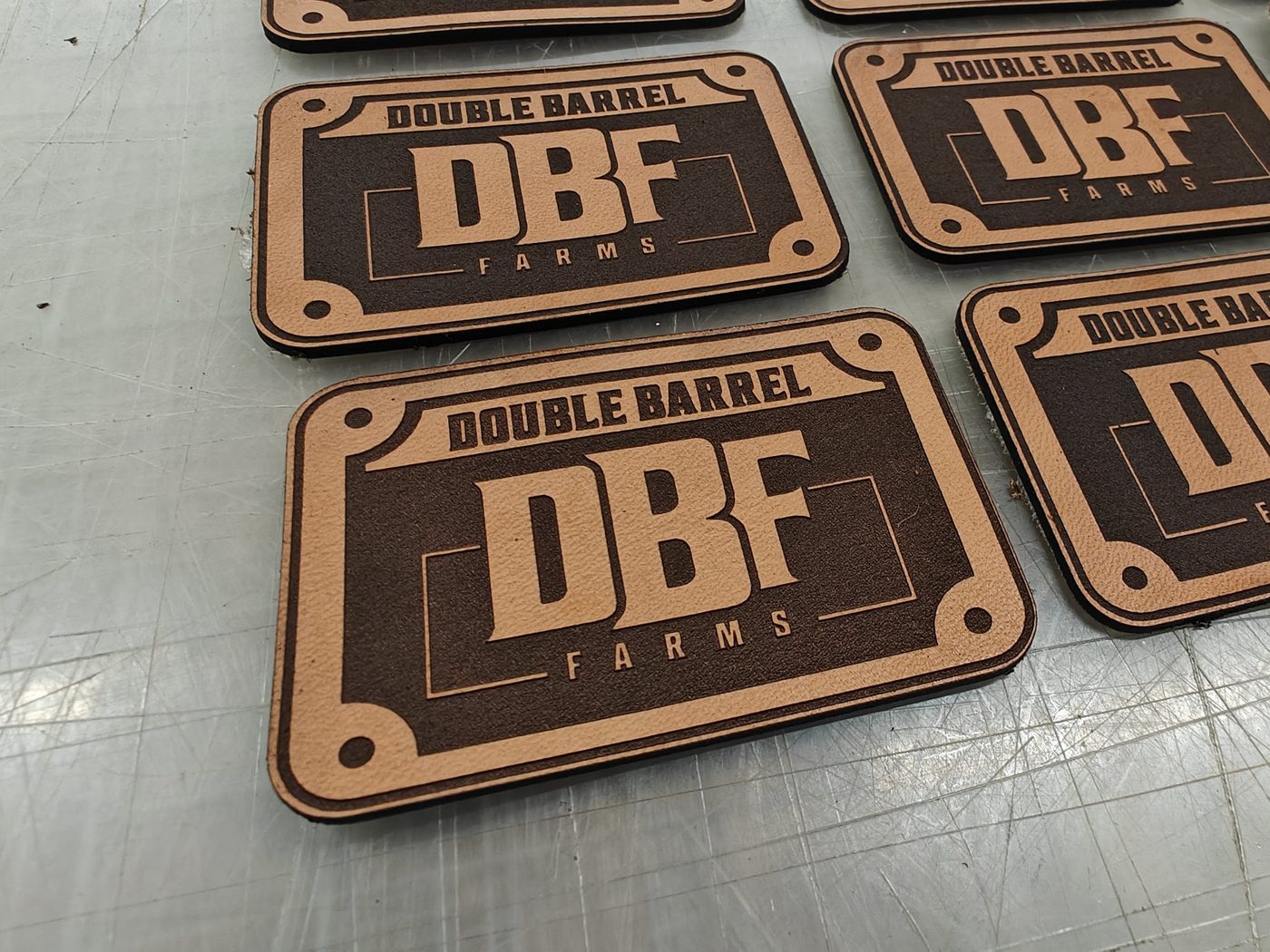 Engraved leather patches — Engraved patches, fresh off the table