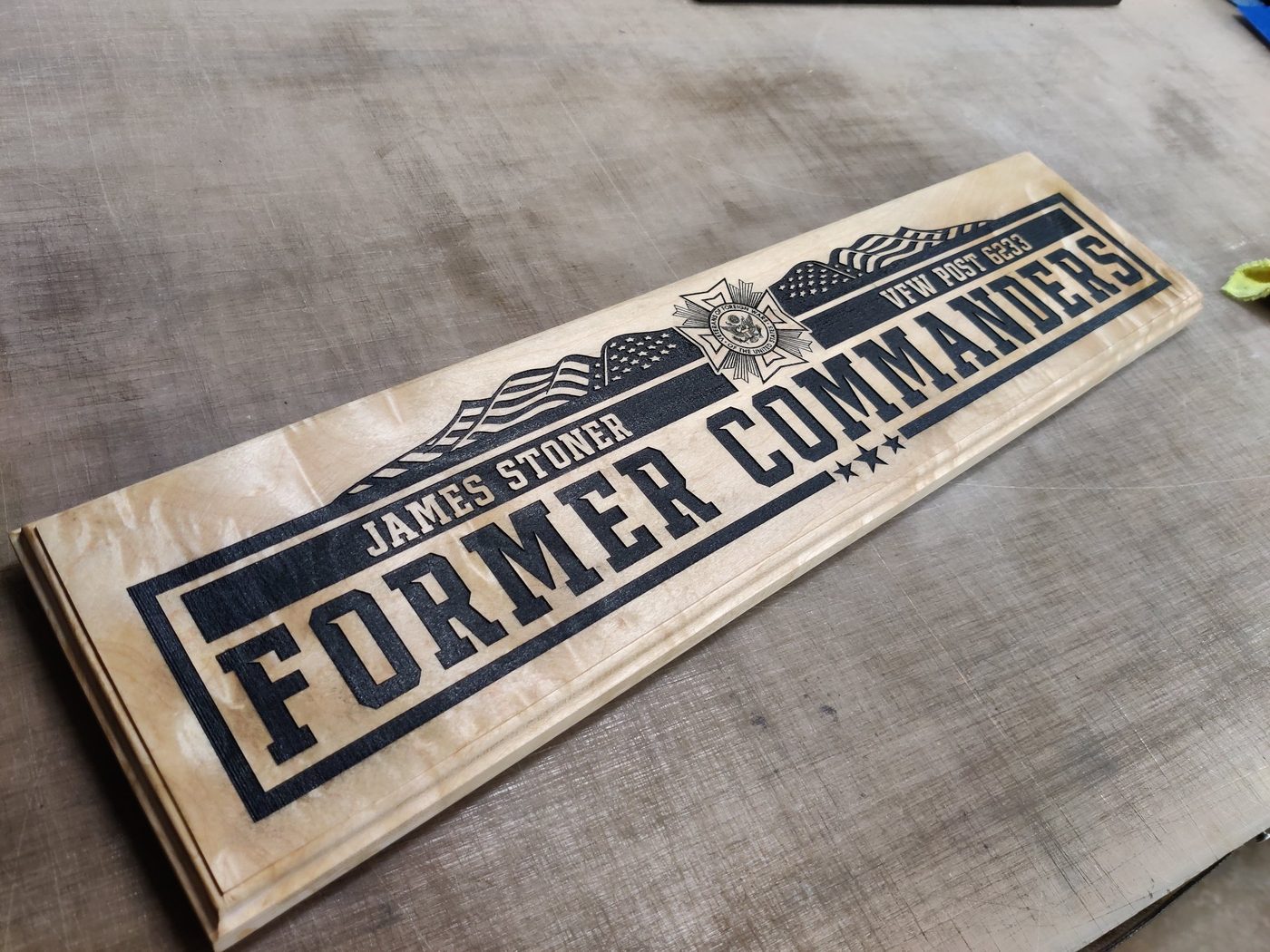 Engraved wood plaque — Engraved commemorative plaque