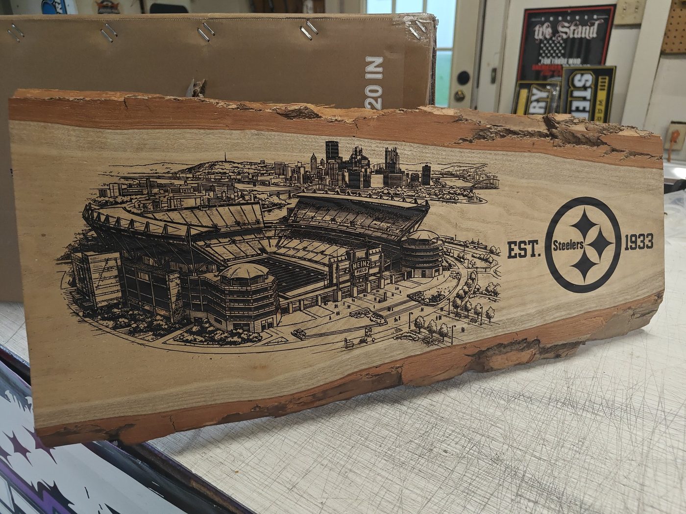 Live-edge stadium slab — Stadium & skyline on live-edge wood