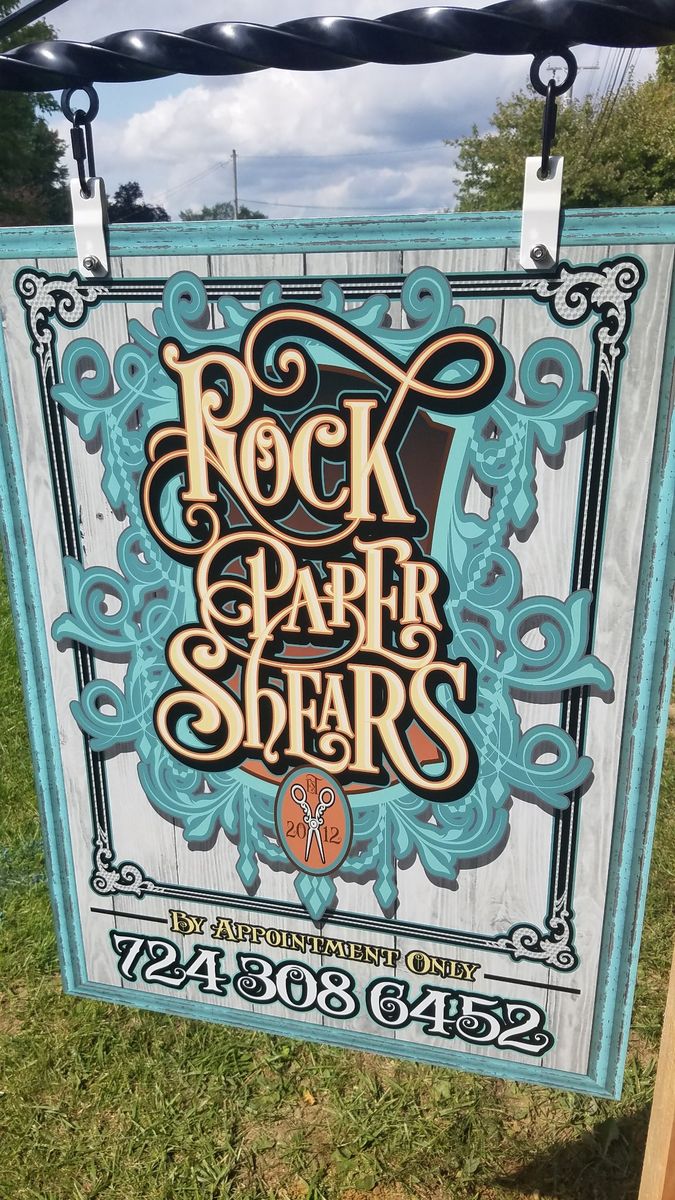 Hanging storefront sign — Sign detail