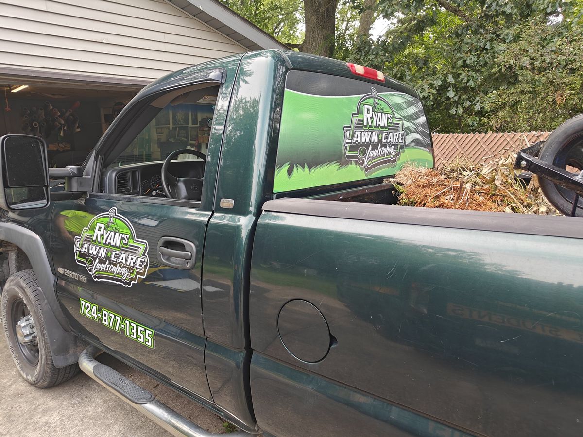 Truck lettering & window perf — Rear window perf